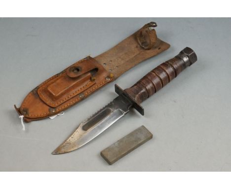 A Japanese Air Force Survival / Fighting Knife Complete With Leather Scabbard And Sharpening Stone. 