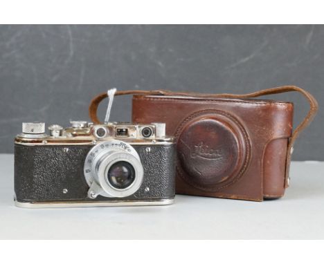 A Vintage Camera Marked Leica D.R.P. Ernst Leitz Wetzlar Luftwaffen - Eigentum No.10794. Complete With Leather Case. 