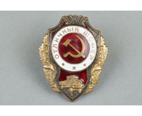 A Russian / Soviet Excellent Driver Award Badge With Red And White Enamel Decoration And Hammer And Sickle To Centre, Screw B