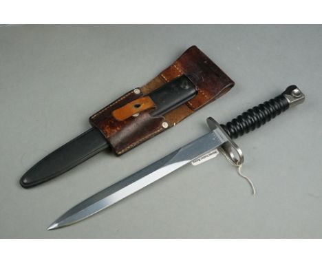 A Swiss Military SIG 57 FV4 Bayonet With Leather Frog And Scabbard. 