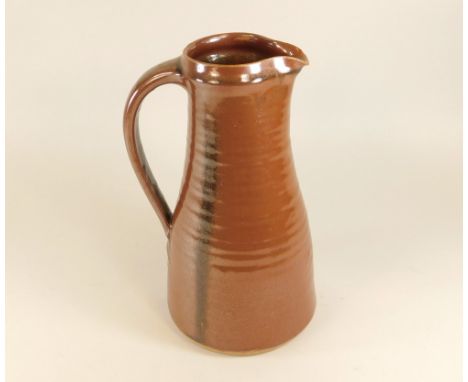 LEACH POTTERY. A large, tall pitcher. Pottery mark only. Height 27cm.