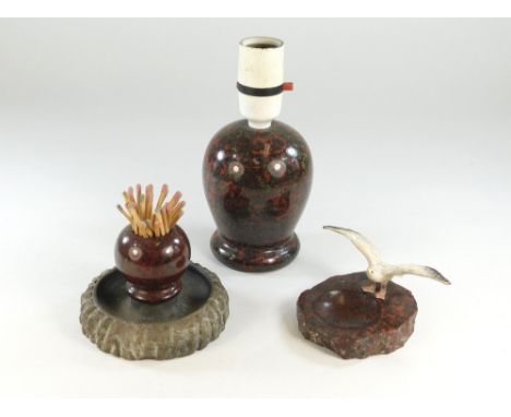 CORNISH SERPENTINE. A red Cornish serpentine small lamp base. Height 17cm, a red &amp; grey serpentine match striker &amp; a 