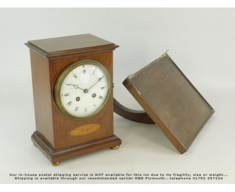 BRACKET CLOCK. An Edwardian mahogany & inlaid chiming mantel clock. Height 25cm. With associated bracket.Please note: we cann