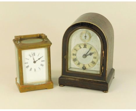 CLOCKS. A French brass cased carriage clock & a small mantel clock with Astral movement. (Both for repair).Please note: we ca