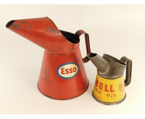 OIL CANS. Two advertising oil cans for Esso &amp; Shell. Esso can max. height 25cm.
