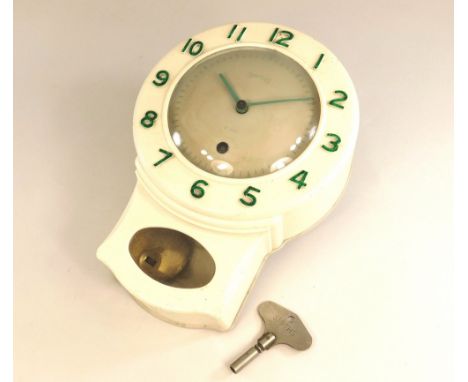 WALL CLOCK. A Smiths cream bakelite eight day wall clock.Please note: we cannot guarantee the continuous working order of any