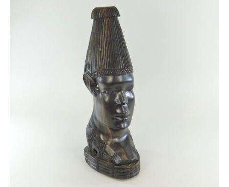 AFRICAN CARVING. An African carved head lamp base. Height 40cm.