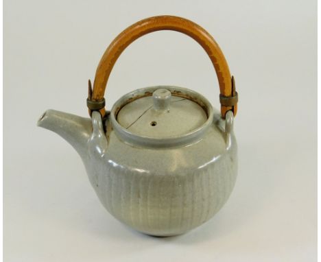 MICHAEL CARDEW. WENFORD BRIDGE? A cane handled teapot with fluted body. Personal &amp; one other obscured mark. Height incl. 