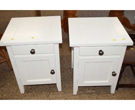 A pair of white finish bedside cabinets and headboard