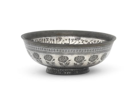 A silver-overlaid alloy bidri talismanic bowl Deccan, 18th Centuryof deep rounded form with everted rim on a short foot, prof