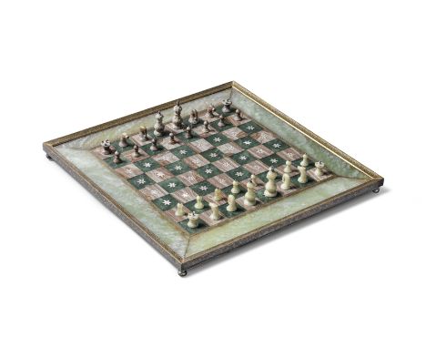 A jade and gold-koftgari steel inlaid chess board North India, 19th Centuryof square form on four ball feet, the spinach jade