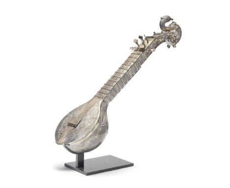 An unusual silver-gilt betel container in the form of a sitar  Oudh, 19th Centuryin the form of a sitar with two hinged doors