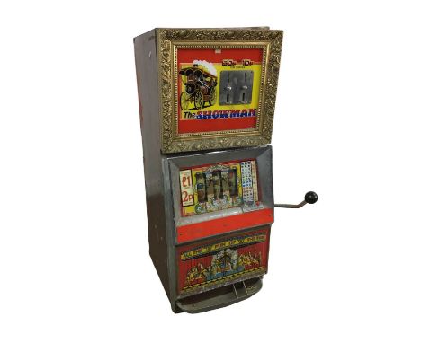 VINTAGE SLOT MACHINE, THE SHOWMAN MODEL the chromium plated and glazed front surrounded with wood effect plastic laminate out