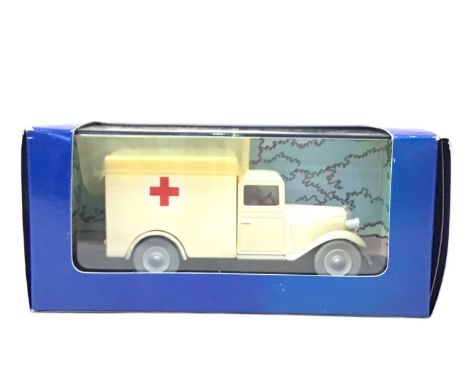 COLLECTION OF TINTIN MODEL VEHICLES, BY MOUSLINART including a taxi, a Ford V8, an ambulance and various others, nearly all i