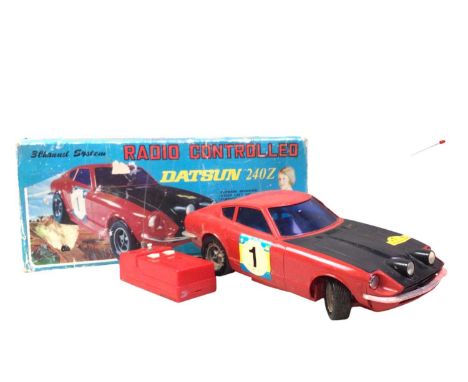 RADIO CONTROLLED DATSUN 240Z CAR, MAKER ASAHI, JAPAN  with controller, in original box44.5cm wide 