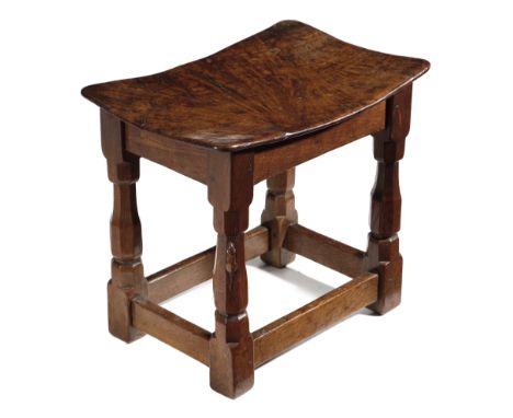 A MOUSEMAN OAK JOINT STOOL BY ROBERT 'MOUSEMAN' THOMPSON (1876-1955), C.1930-40 with a burr oak dished top, on faceted balust