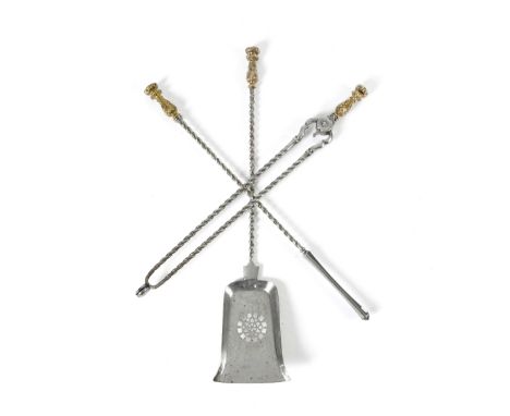 A MATCHED SET OF STEEL FIRE TOOLS MID-19TH CENTURY AND LATER&nbsp;with brass leaf decorated baluster handles, above a spiral 