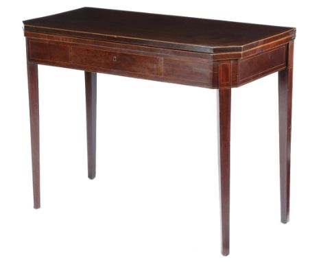 A GEORGE III MAHOGANY TEA TABLE C.1790-1800 inlaid with boxwood stringing, the rectangular fold-over top with canted corners,