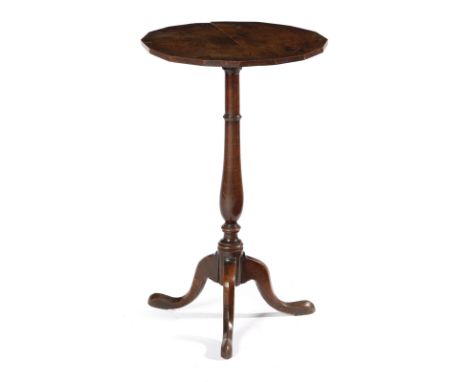 A GEORGE III OAK TRIPOD TABLE C.1770 the circular fixed top with a faceted edge, on a baluster turned stem and cabriole legs 