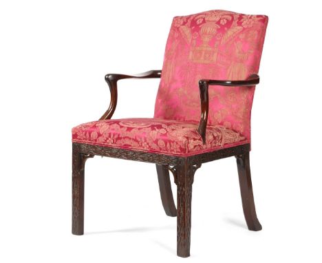 A GEORGE III MAHOGANY OPEN ARMCHAIR C.1770 with an arched padded back and seat, covered with chinoiserie damask fabric, the c