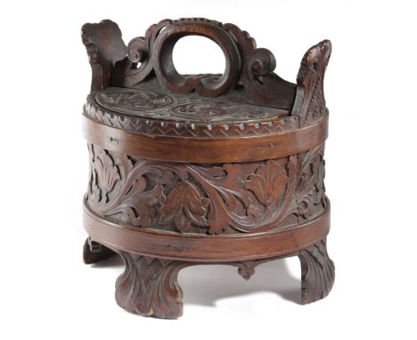 A NORWEGIAN FOLK ART CARVED AND STAINED PINE BOX MOLDE, LATE 19TH CENTURY of staved construction and with bentwood straps, al