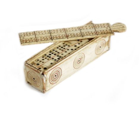 A FRENCH PRISONER OF WAR BONE GAMES BOX EARLY 19TH CENTURY decorated with rondels with red colouring, the sliding cover pierc