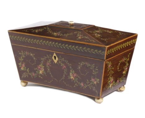 A MAHOGANY TEA CADDY IN SHERATON REVIVAL STYLE 19TH CENTURY of sarcophagus shape painted with ribbons and swags of flowers, w