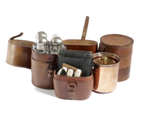 THREE BROWN LEATHER CASED CAMPAIGN ITEMS LATE 19TH / EARLY 20TH CENTURY comprising: a copper burner by A. Bassett &amp; Sons,