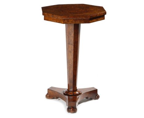 A WILLIAM IV BURR YEW LAMP TABLE C.1830 the octagonal fixed top on a tapering stem and a triform base with scroll feet 72.8cm