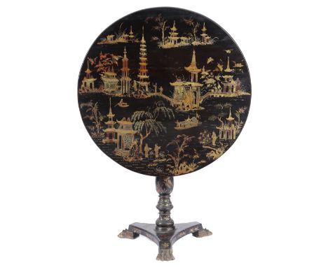 A CHINESE EXPORT AUBERGINE LACQUER TRIPOD TABLE EARLY 19TH CENTURY decorated in gilt with a watery landscape, with pagodas, w