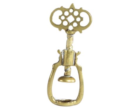A GEORGE III BRASS NUTCRACKER C.1770-80 of open cage form with a screw-action and a pierced handle 7.4cm high Provenance The 