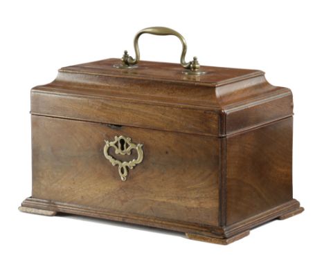 A GEORGE II MAHOGANY TEA CADDY C.1750-60 the moulded hinged top with a brass swing handle, revealing an interior with three d