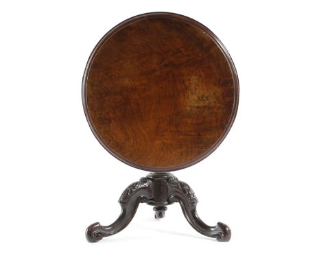 A VICTORIAN WALNUT MINIATURE BREAKFAST TABLE C.1860-70 possibly an apprentice piece, the circular tilt-top on a lobed stem an