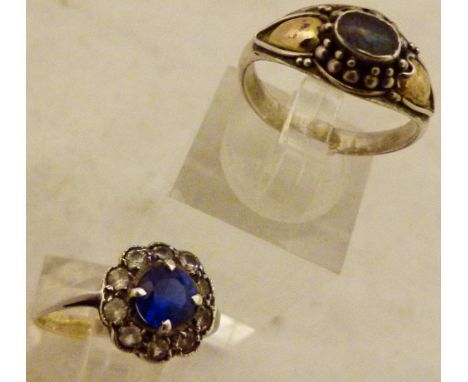 STONE SET RINGS. Two sterling silver stone set rings including opal, size O