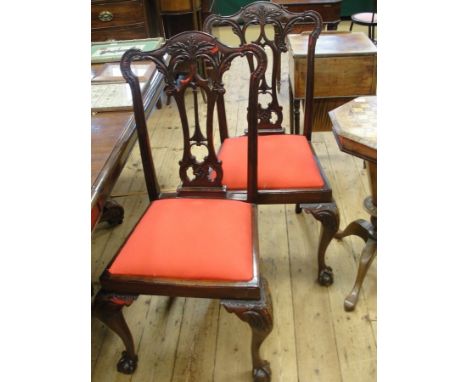 A set of four Victorian Chippendale chairs with drop-in seats