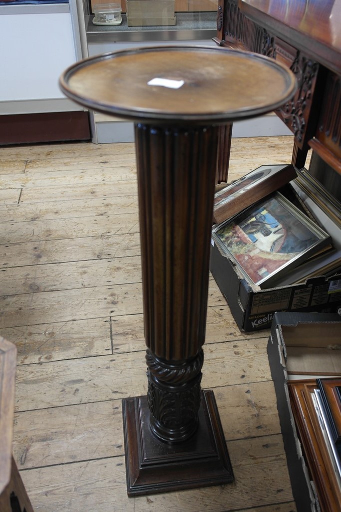 A mahogany aspidistra stand