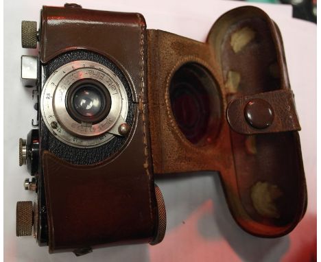 A Leica I camera Model No 55828 with Elmar "1 35 F50mm lens with Leica leather case, c1930