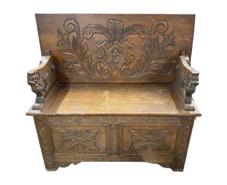 Late 19th / Early 20th Century oak monks bench with gothic carved detail and storage base, 106cm wide
