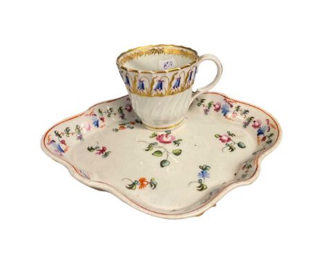 Newhall teapot stand with typical floral design, pattern number 660 together with a Worcester porcelain cup with a gilt desig