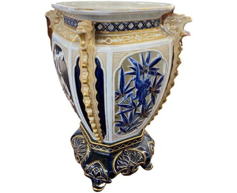 Worcester 19th Century vase in the aesthetic style, quatro lobe shape with pierced decoration of birds and prunus on shaped b