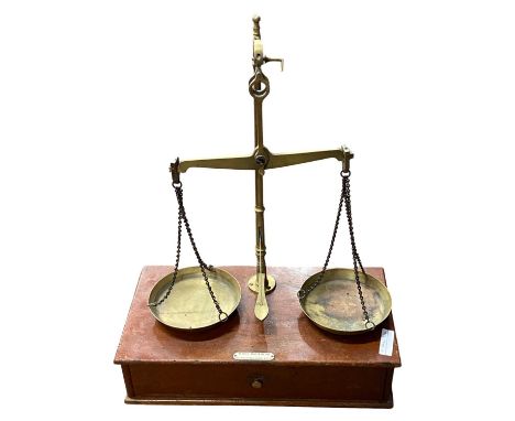 Pair of brass beam scales bearing makers label for De Grave, Short &amp; Co, London, 37cm wide