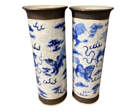 Pair of Chinese crackle ware cylindrical shape vases decorated with dragons chasing the flaming pearl, 30cm high 