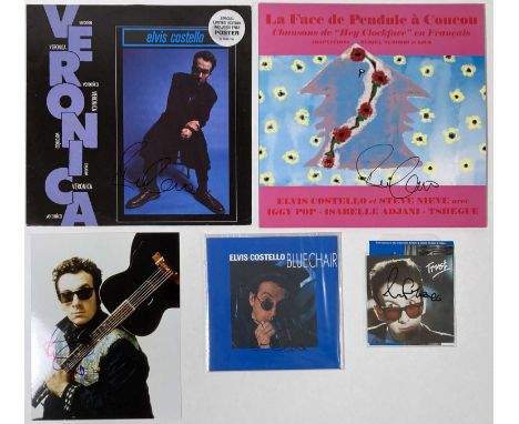 Five items signed by Elvis Costello, inc LPs, CD booklets, 7".