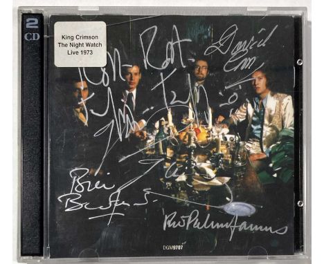 A CD - King Crimson - The Night Watch Live 1974, signed to booklet in silver ink by Pay Mastelotto, Bill Bruford, Robert Frip