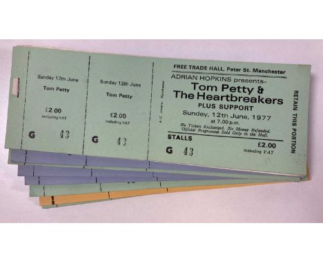 A collection of partial ticket books, with approximately 205 complete, untorn and unused tickets for Tom Petty and the Hearbr