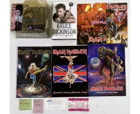 Iron Maiden memorabilia to include: four ticket stubs inc June 1980, three programmes, a boxed Eddie toy, a Bruce Dickinson a
