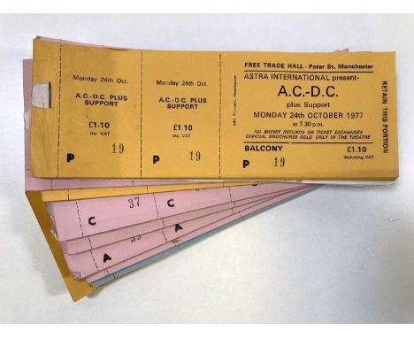 11 partial ticket books, with approximately 234 complete, untorn and unused tickets for AC/DC at the Manchester Free Trade Ha