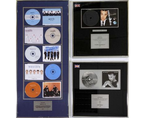 Three framed CD presentation awards: two (16 x 16") Robbie Williams, Gary Barlow. One (15 x 32") for Westlife. All presented 