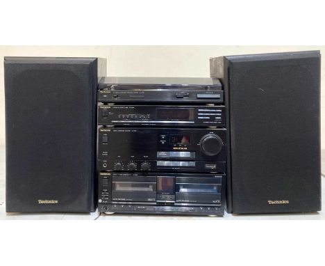 A collection of Technics Hifi to include a SL-J110R turntable, a ST-X999L tuner, a SU-X955 amplifier, a RS-X980 cassette deck