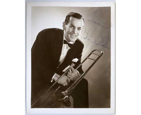 Glenn Miller, vintage 10x8 glossy b&amp;w publicity photo of Miller with his trombone, with clear signature, in excellent con